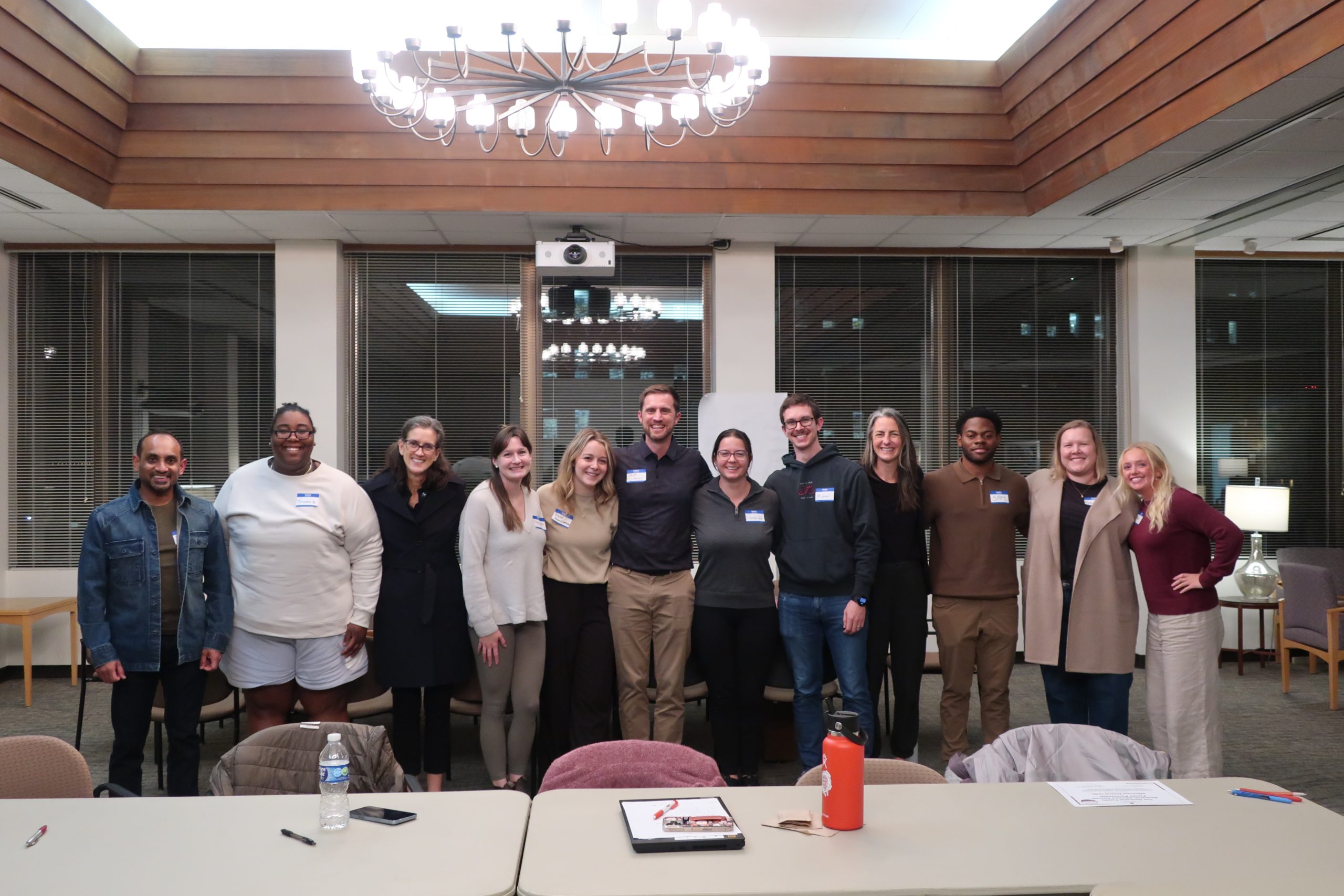 Photo of twelve members of the Neonatal Family Research Advisory Council including families, physicians, research staff. researchers, and students. 