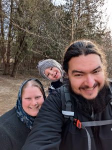 Family with a baby on a hike