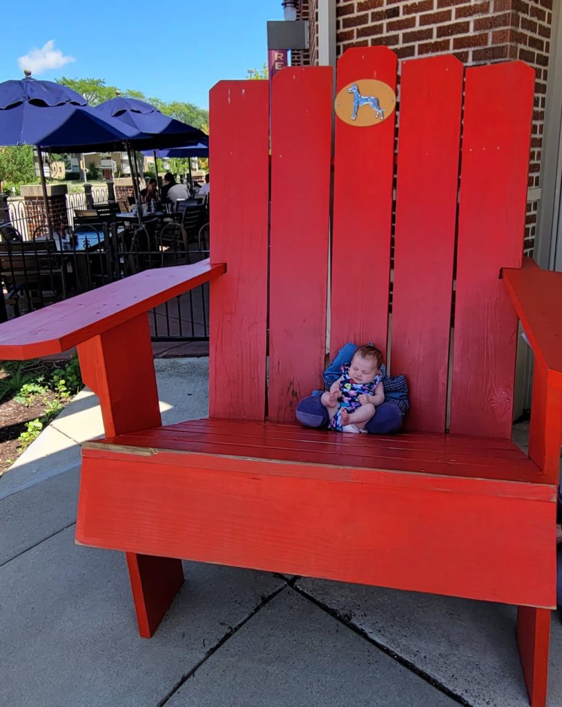 Baby in an over-sized chair
